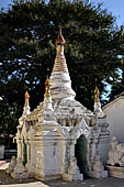 Bagan Myanmar. Shwezigon pagoda. The precinct is full of numerous images, inscribed bells, stone inscriptions and other paraphernalia.  